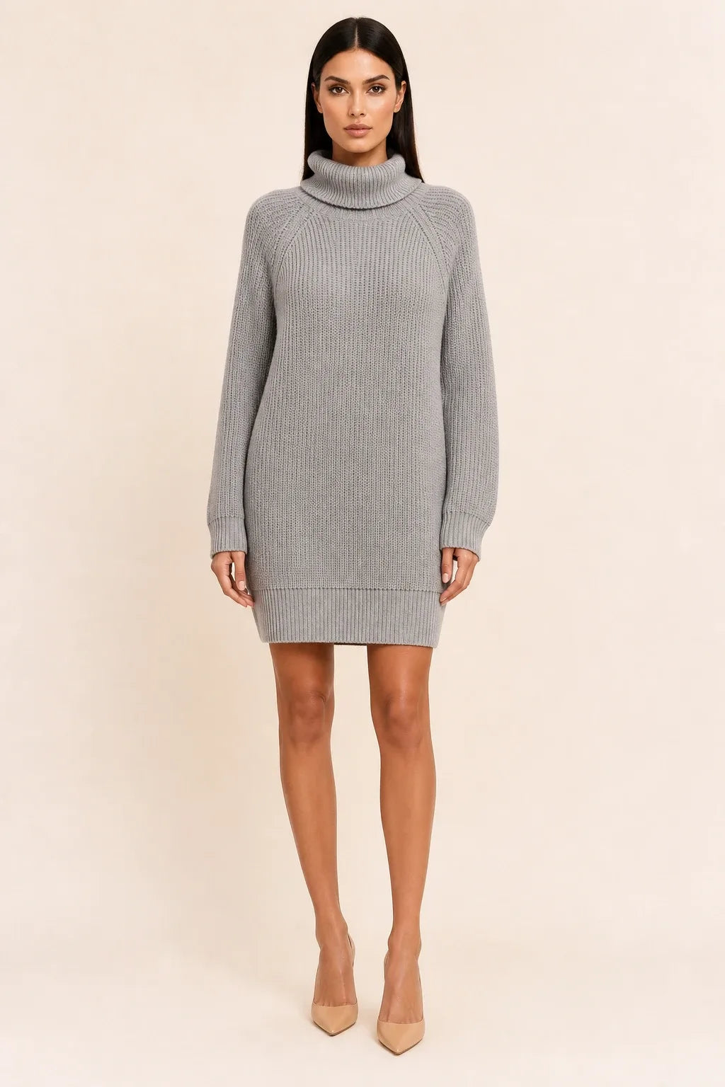 Gray turtleneck sweater dress on a model in a contrapposto stance