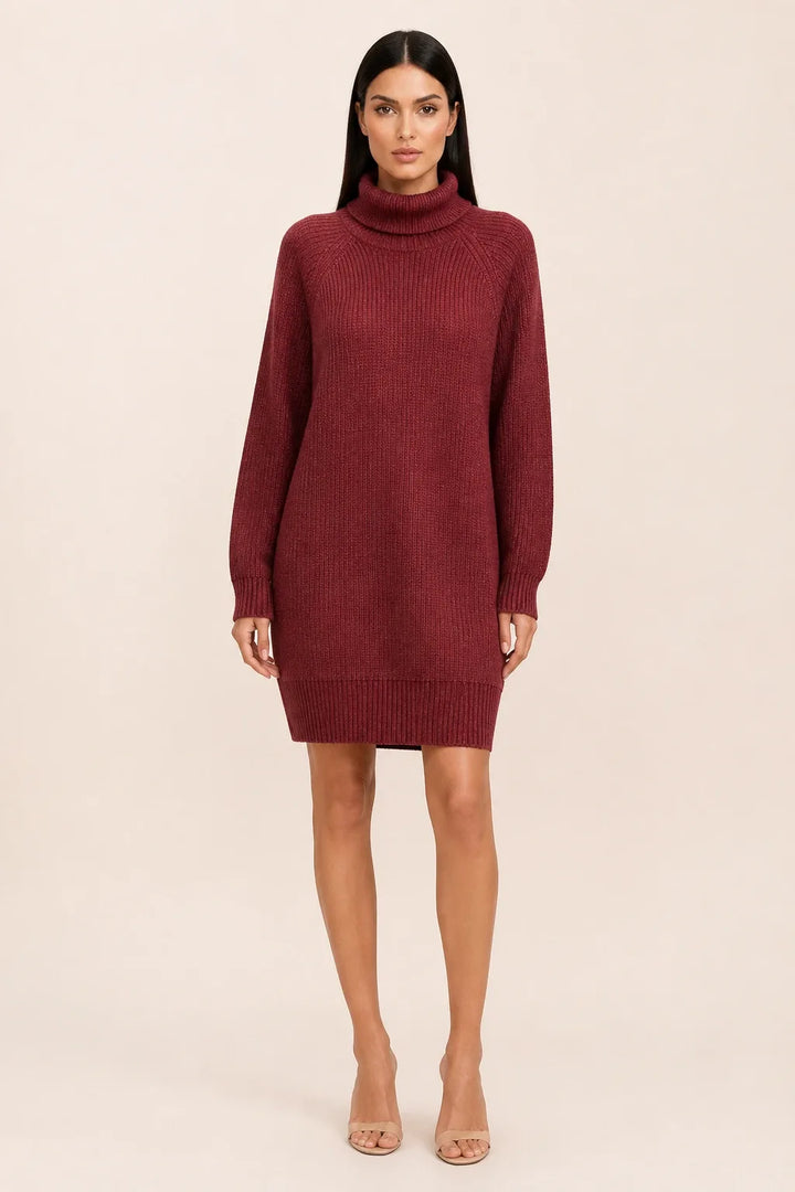 Red turtleneck sweater dress on a model in a contrapposto stance