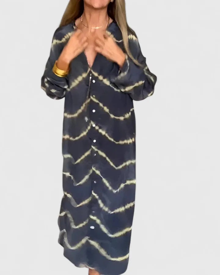 Close-up detail of navy tie-dye midi shirt dress fabric and construction
