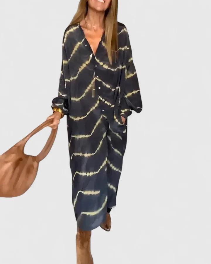 Navy tie-dye midi shirt dress on model at three-quarter turn