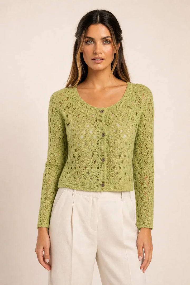 Green crochet scallop cardigan on model in contrapposto stance