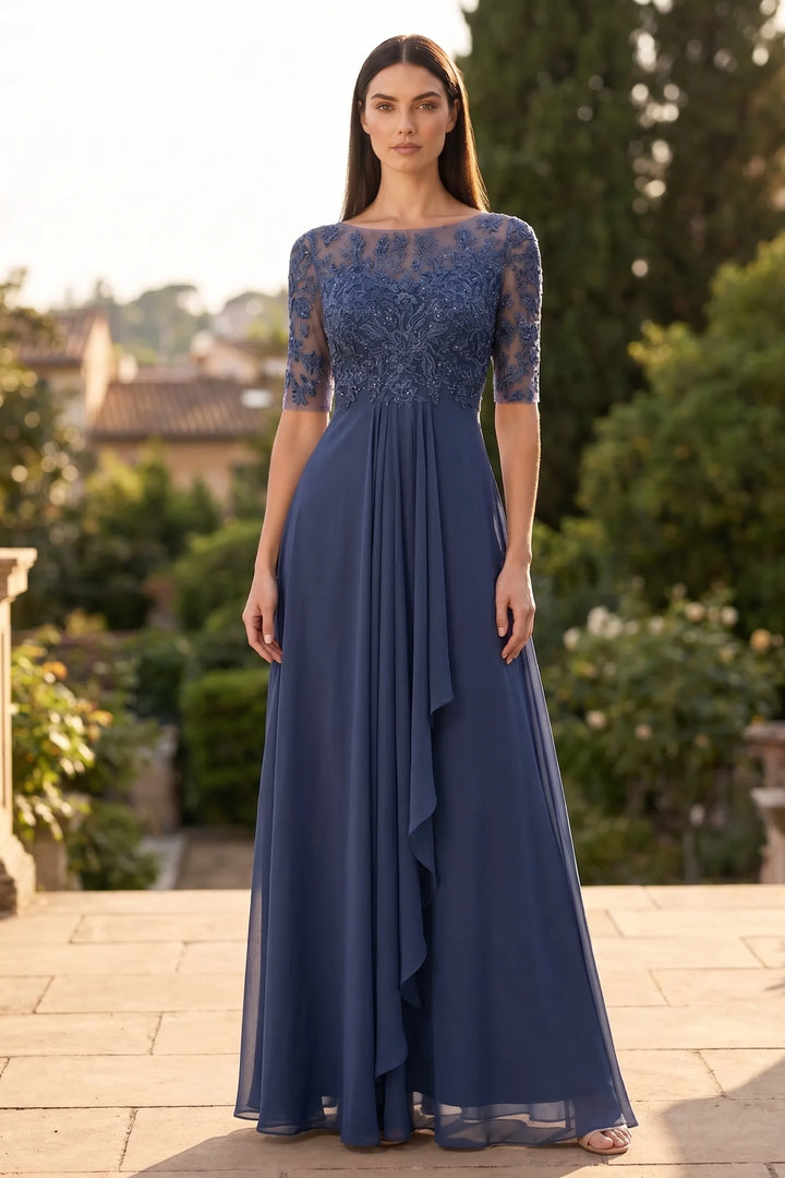 Model wearing blue lace illusion midi dress in lifestyle setting