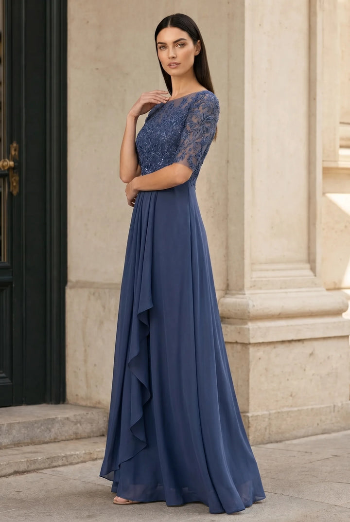Blue lace illusion midi dress on model in three-quarter turn