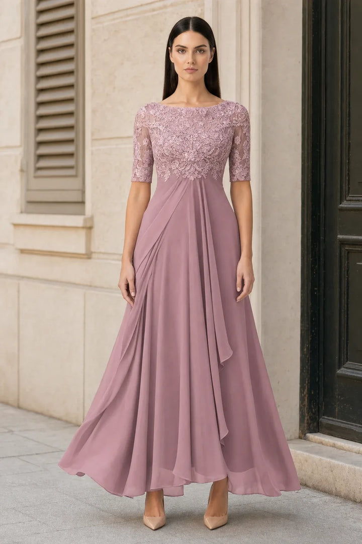Pink lace illusion midi dress on model in contrapposto stance