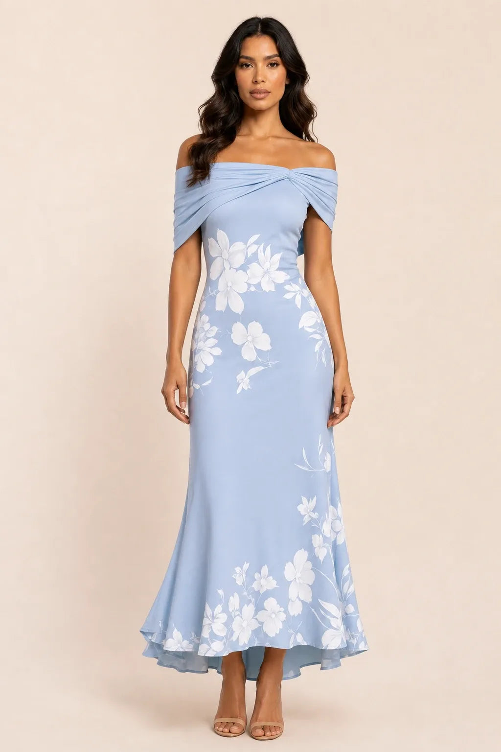 Blue twist knot mermaid midi dress on model in contrapposto stance