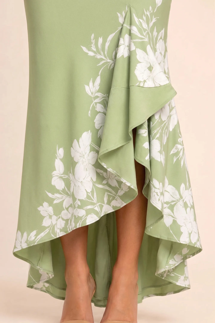 Close-up detail of twist knot bodice on green mermaid midi dress