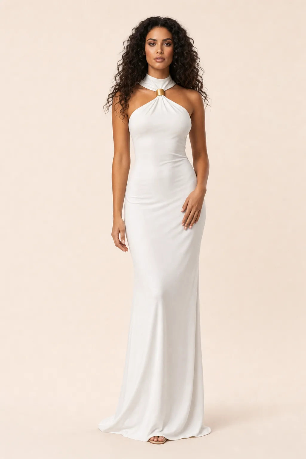 White halter maxi gown with gold ring neckline detail, model in contrapposto stance