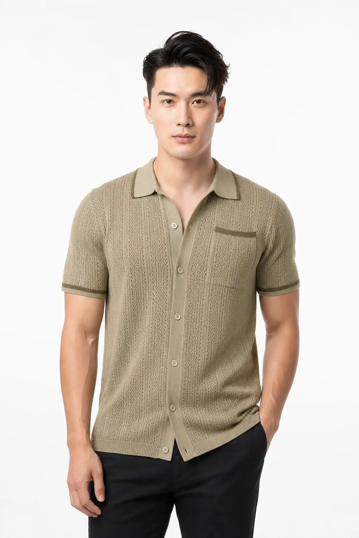 Khaki cable knit camp shirt on a model in a contrapposto stance