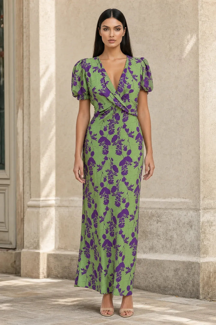 Green floral wrap midi dress on model in contrapposto stance