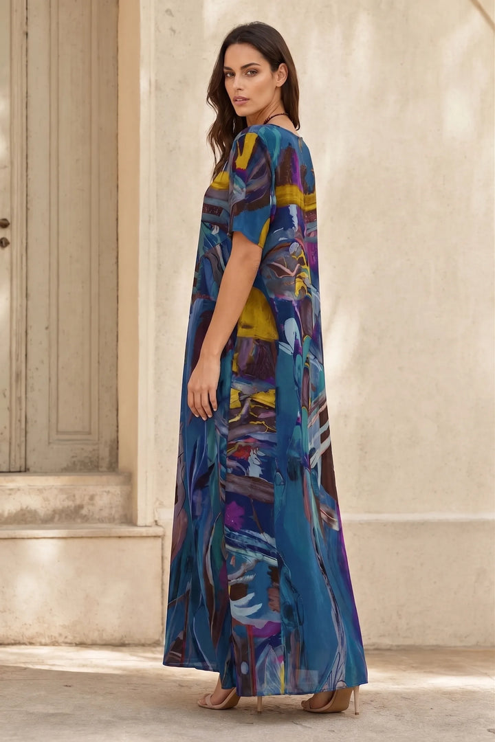 Blue abstract-print midi dress on model in three-quarter turn