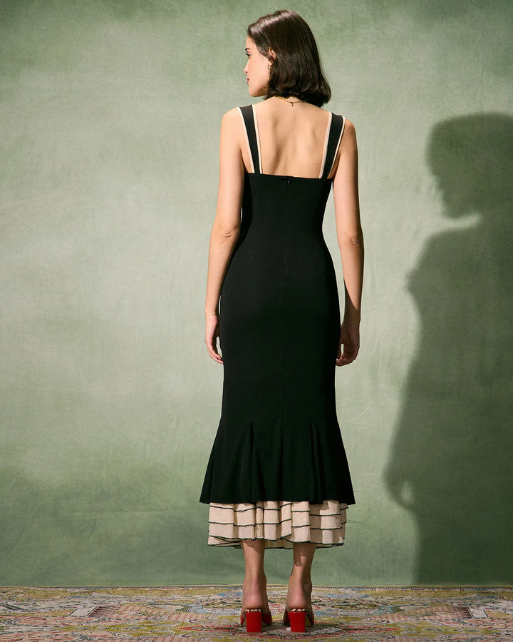 Black sweetheart midi dress on model, alternate styling view