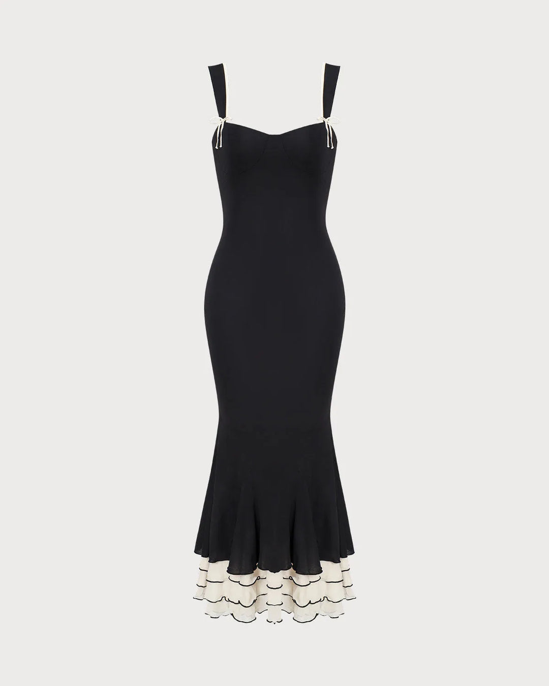 Black fitted mermaid midi dress on model, additional angle view