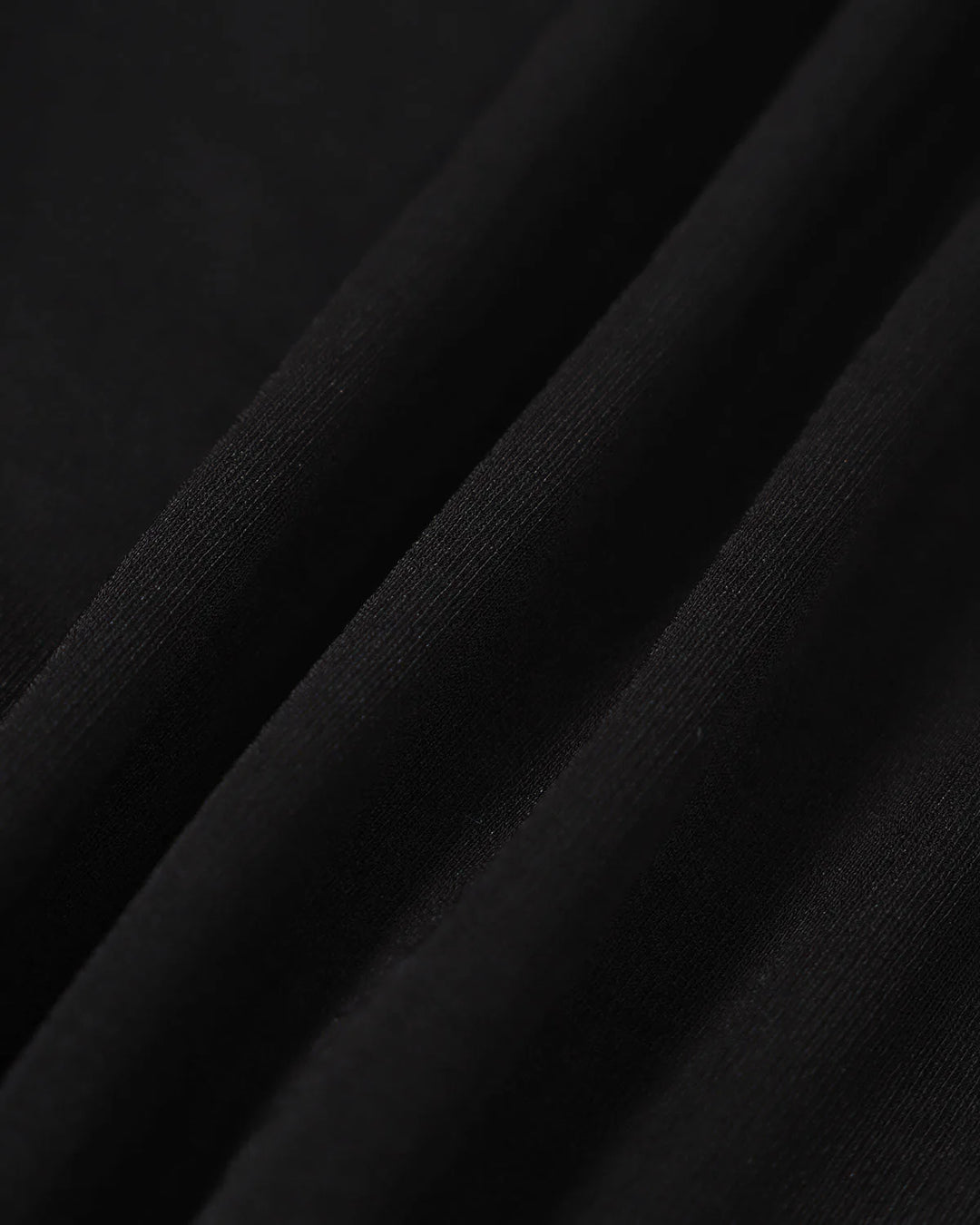 Black sweetheart neckline mermaid midi dress on model, back or detail view