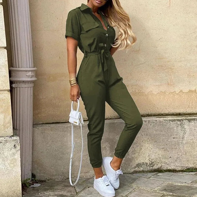 Model wearing a green striped belted jumpsuit