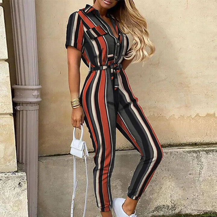 Model facing forward wearing a striped belted jumpsuit