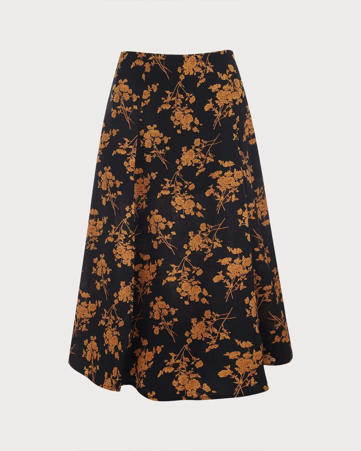 Black floral midi dress with front slit, model in alternate standing pose
