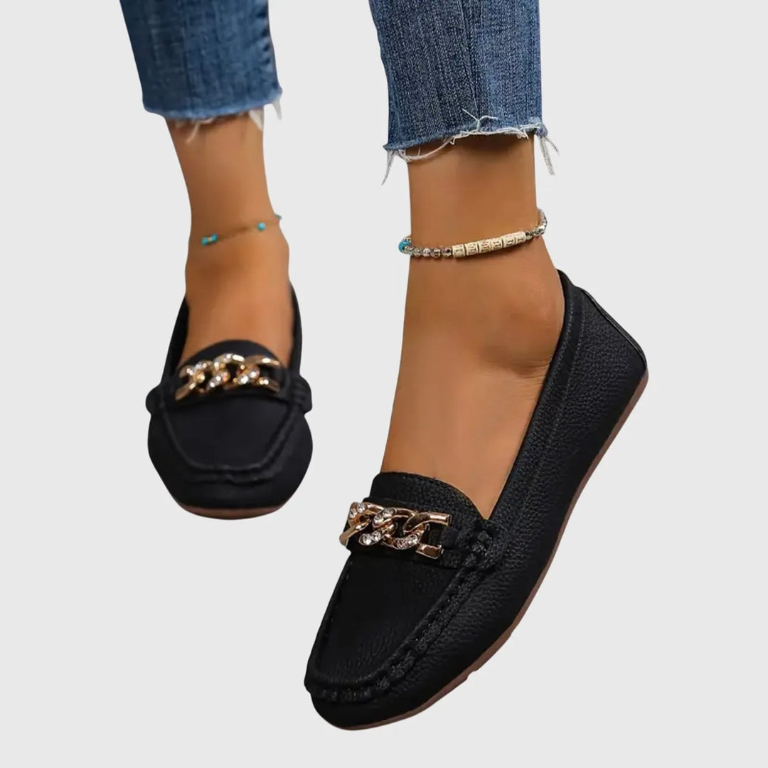 Black chain embellished loafer, three-quarter angle view