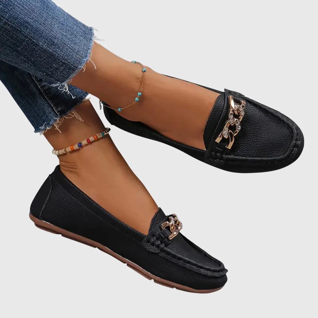 White chain embellished loafer, side profile view
