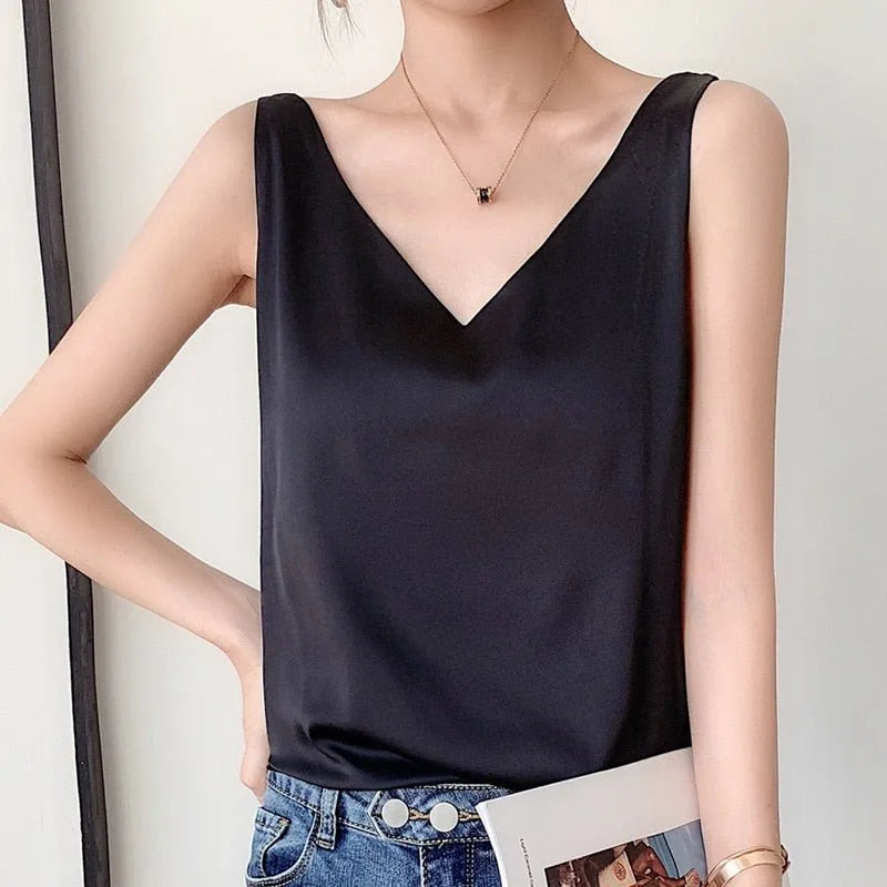Black satin v-neck cami on model facing forward