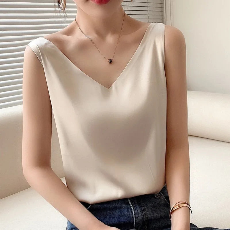 Champagne satin v-neck cami on model