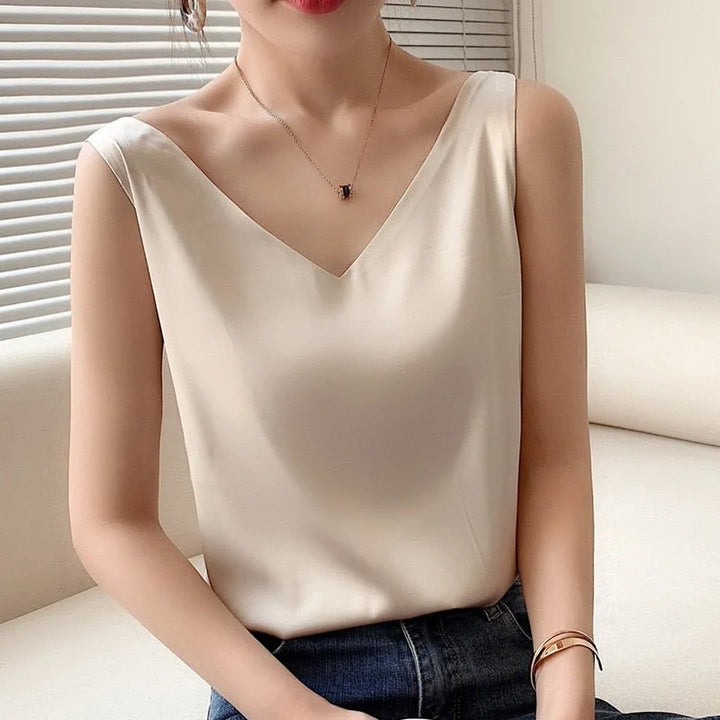 Champagne satin v-neck cami on model