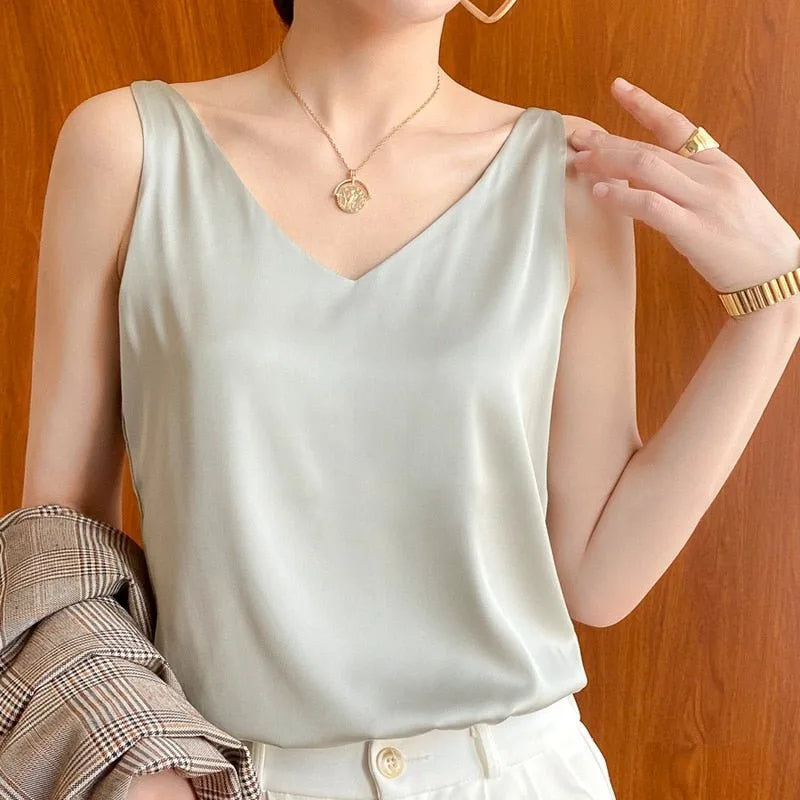 Light green satin v-neck cami on model