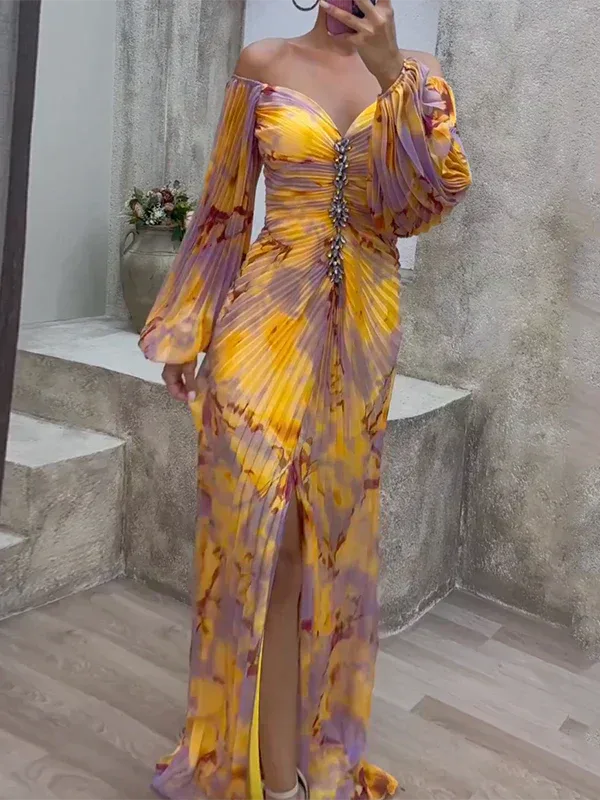 Woman in a pleated off-shoulder multicolor gown, turned three-quarters