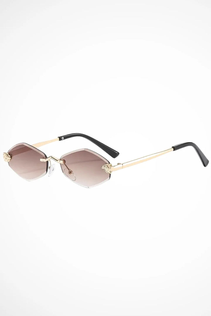 Geometric rimless gradient sunglasses in gold and beige tones, front view