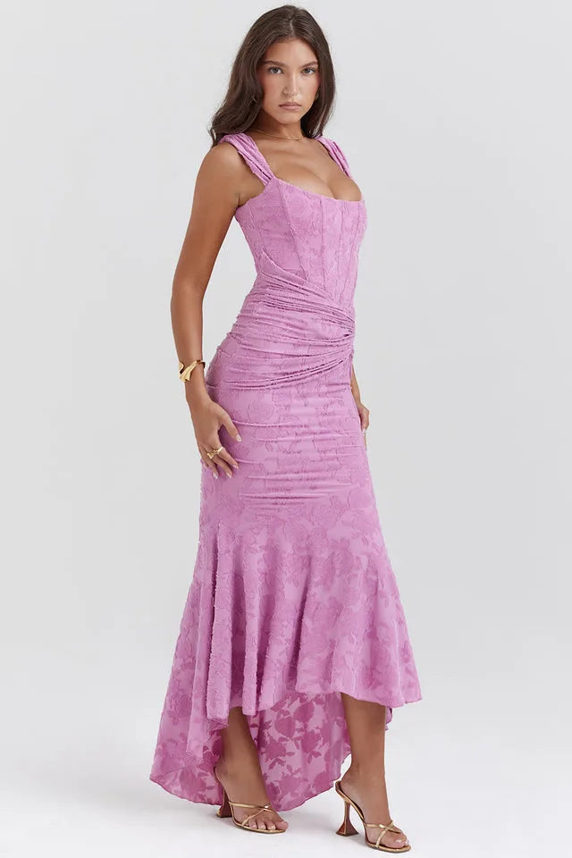 Model in a pink lace mermaid gown showcasing the full-length silhouette
