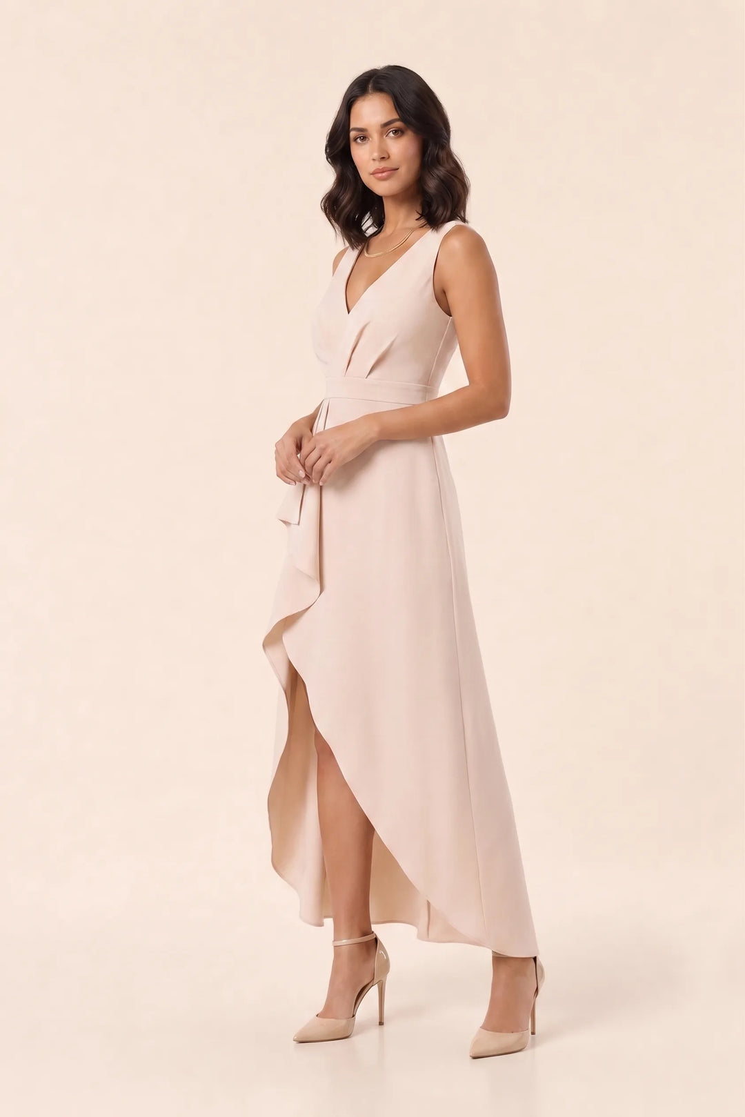 Beige ruffle high-low midi dress on a model in a three-quarter turn