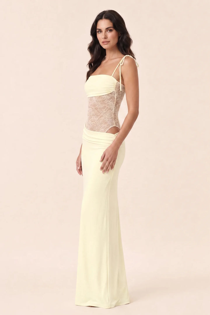 Light yellow lace corset maxi dress on model in three-quarter turn