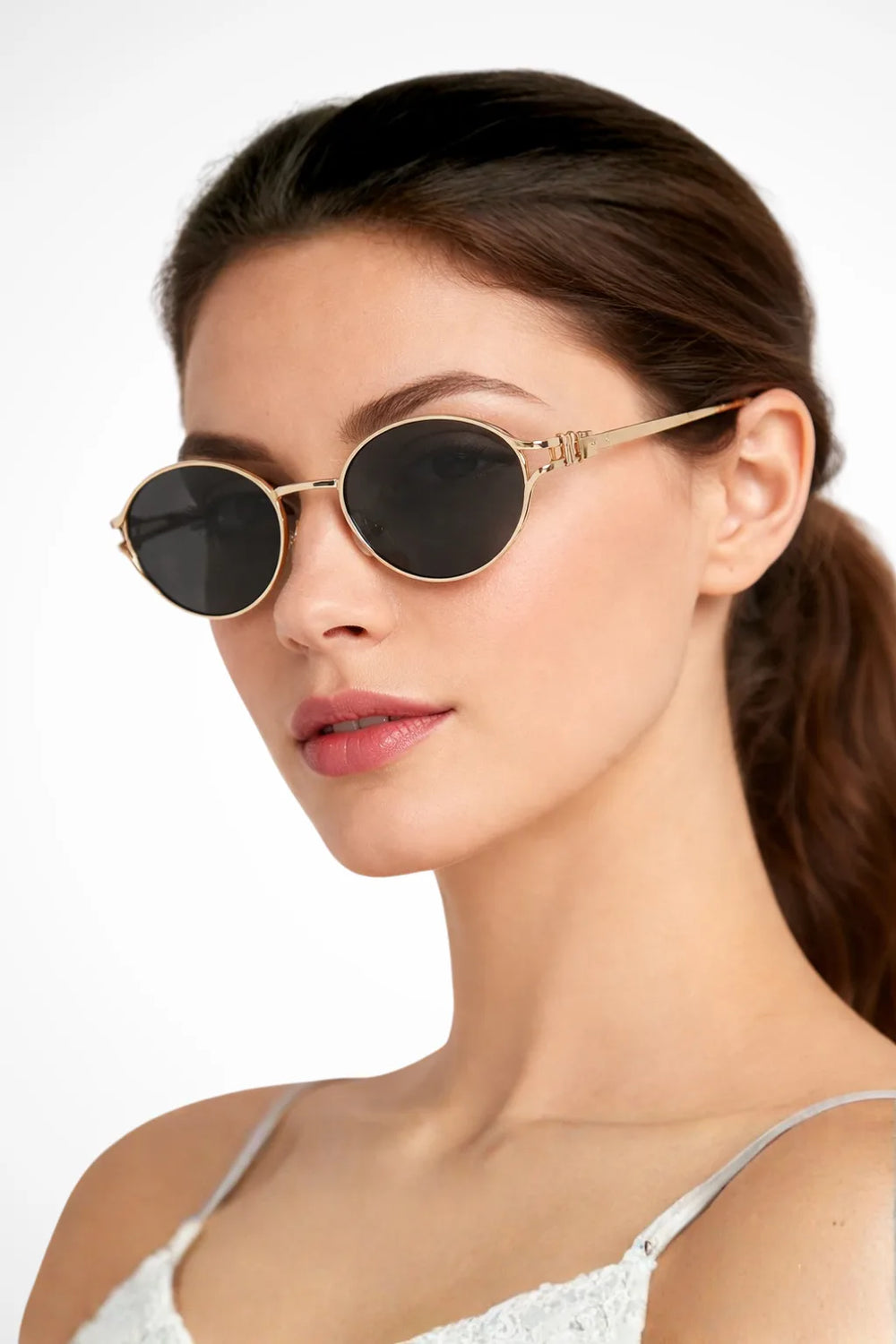 Slim oval metal eyeglass frames in black and gold tones, front view