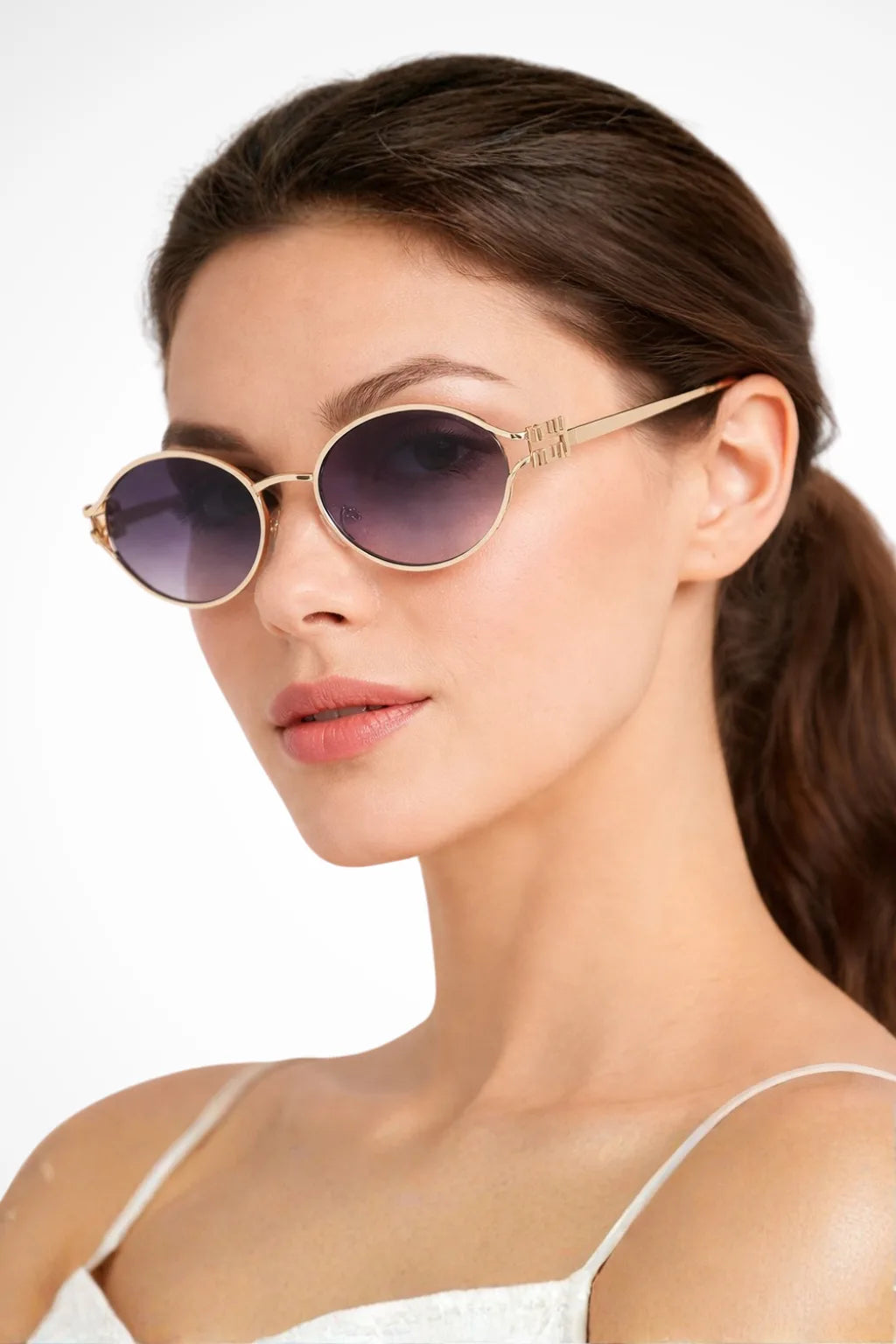 Slim oval metal eyeglass frames in gray and gold tones, front view