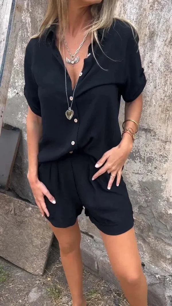 Black matching shirt and shorts set, model in side profile
