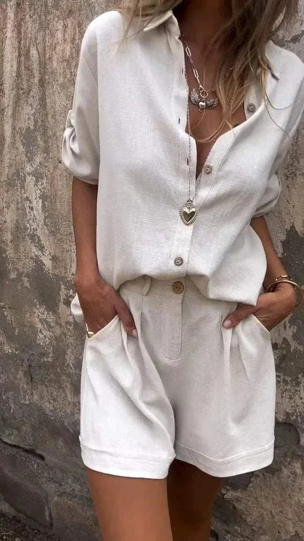 White matching shirt and shorts set, model facing forward