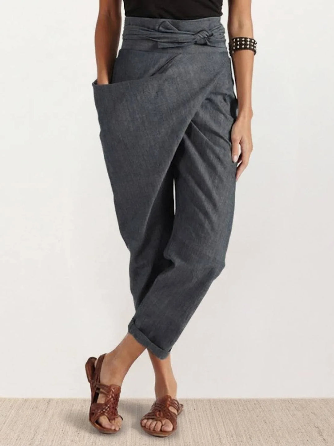Gray wrap front tapered pants on model, front-facing full-length view