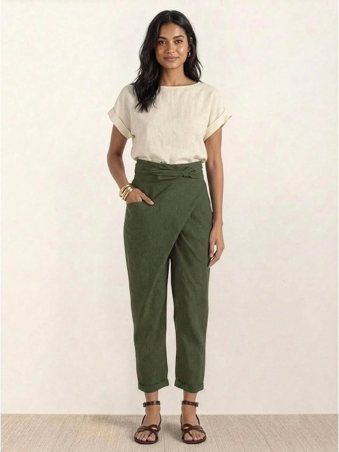 Gray wrap front tapered pants on model, full-length view