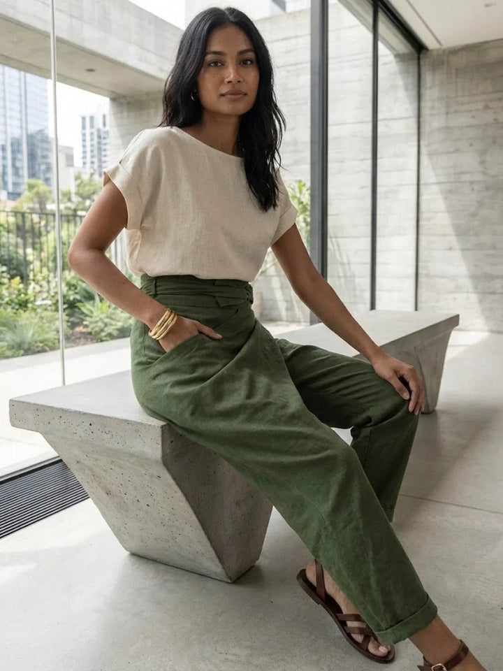 Gray wrap front tapered pants on model, full-length alternate view