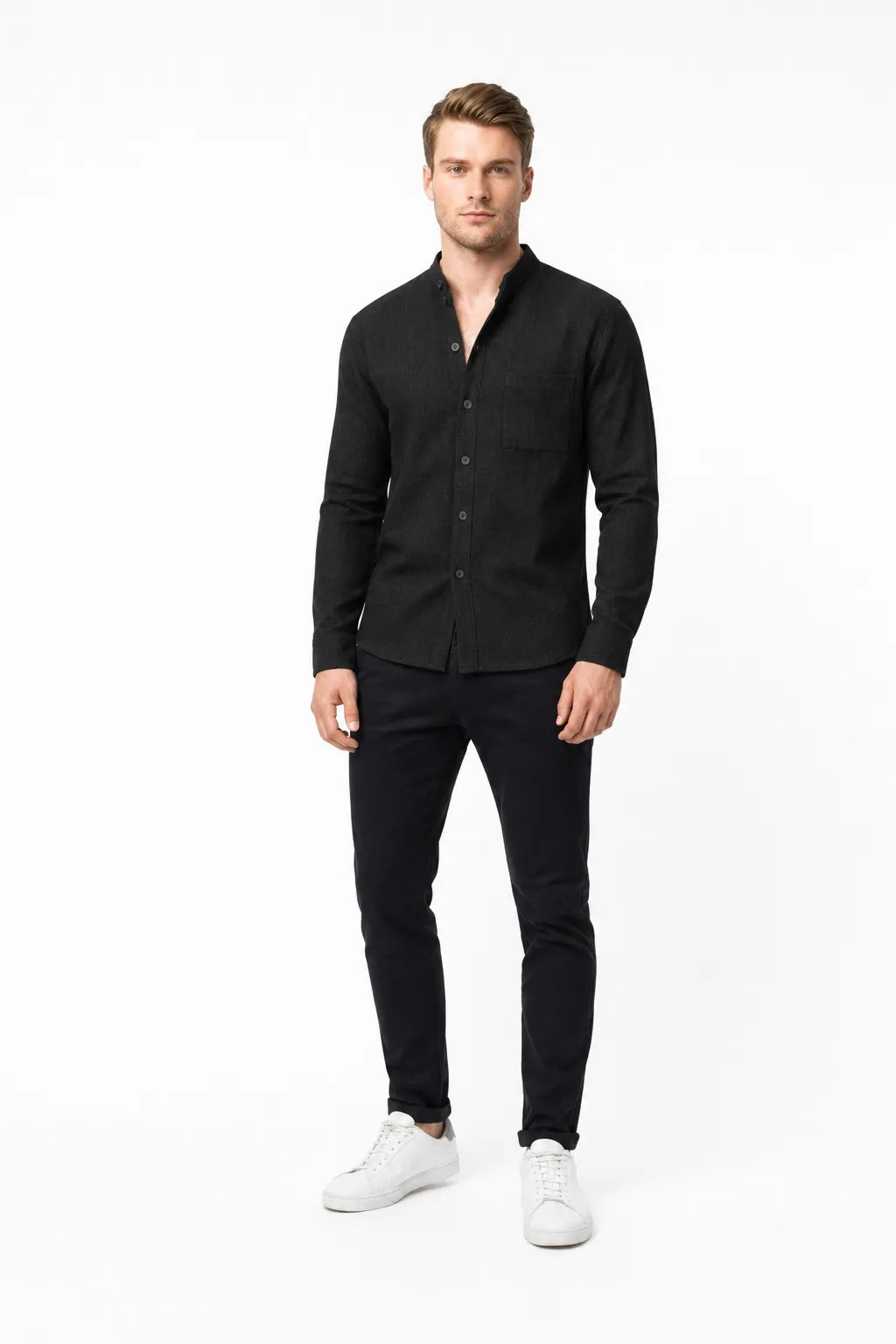 Black waffle knit co-ord set on model in contrapposto stance