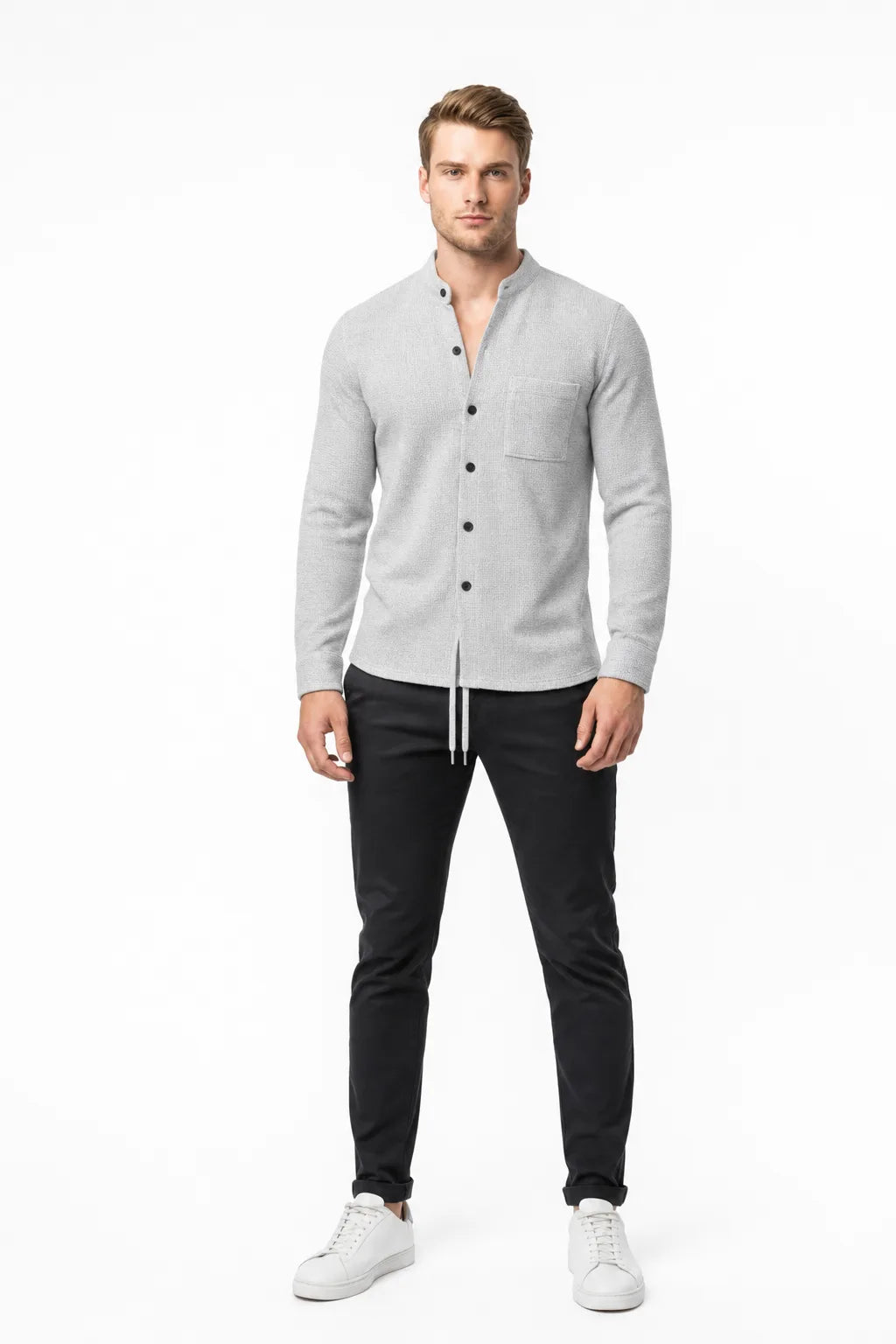 Gray waffle knit co-ord set on model in contrapposto stance