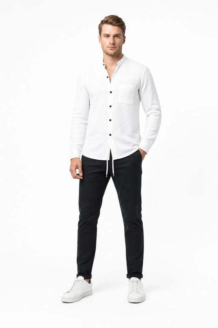White waffle knit co-ord set on model in contrapposto stance