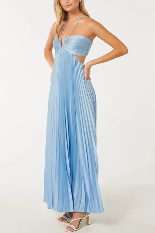 Close-up detail of pleating and halter neckline on a blue maxi dress