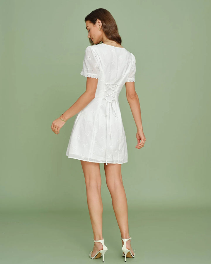 White eyelet button mini skirt, alternate styling view