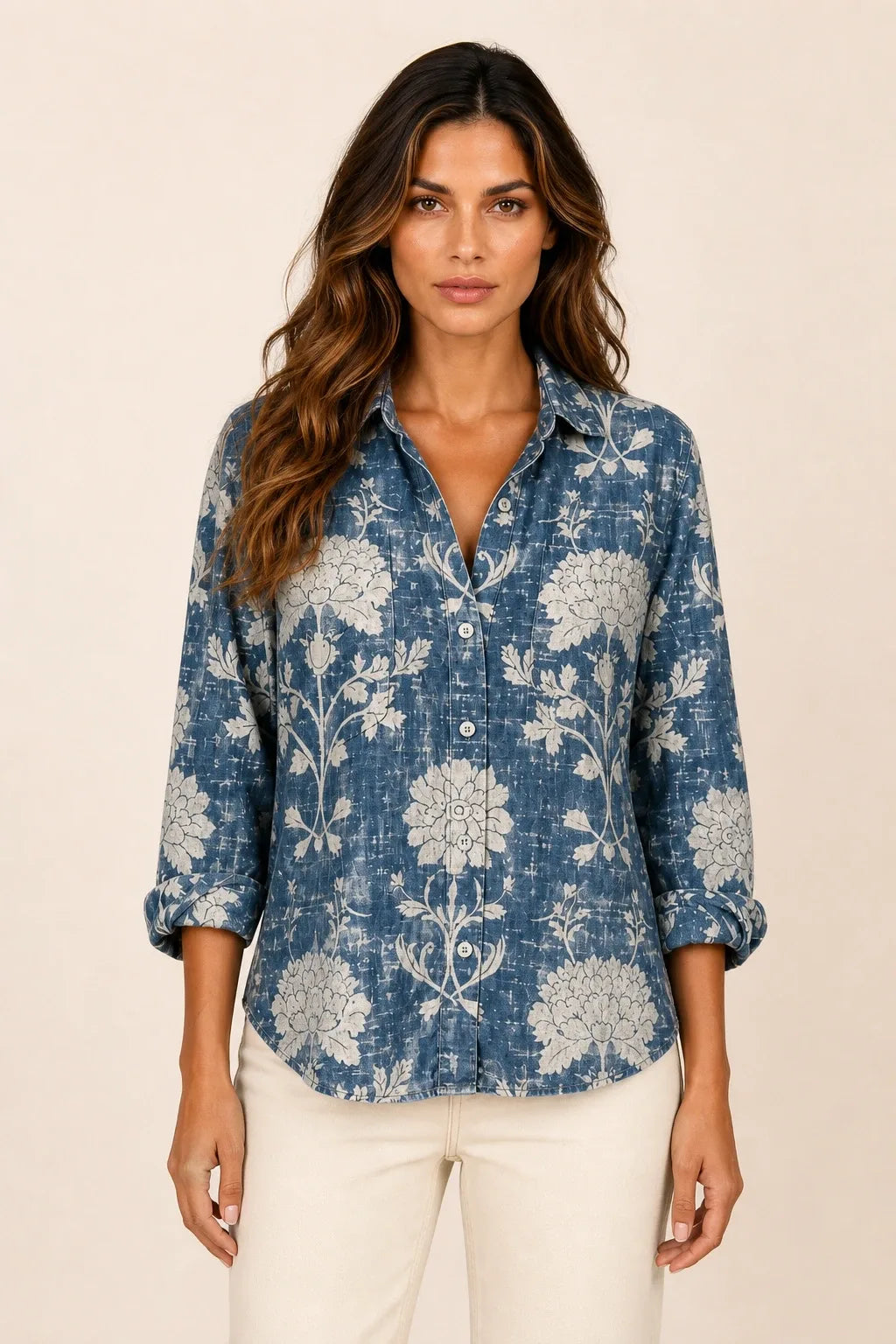 Blue bandana print button-down blouse on model in contrapposto stance