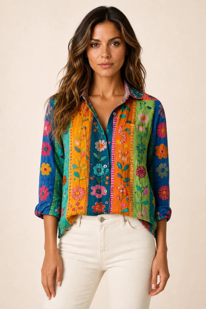 Multicolor bandana print button-down blouse on model in contrapposto stance