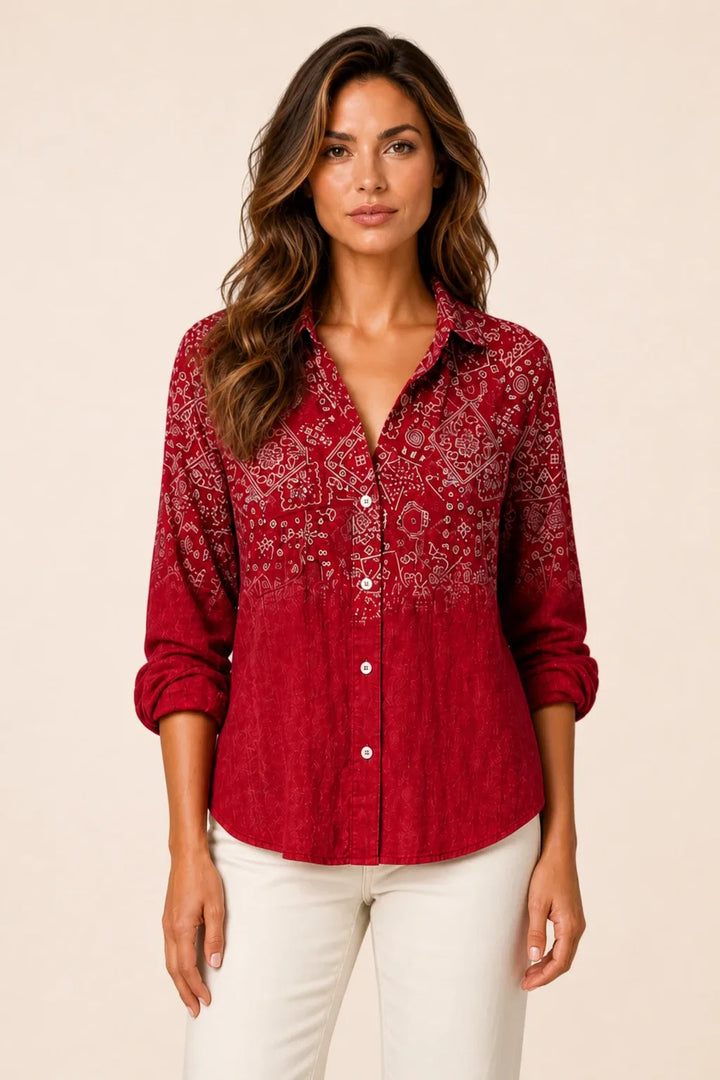 Red bandana print button-down blouse on model in contrapposto stance