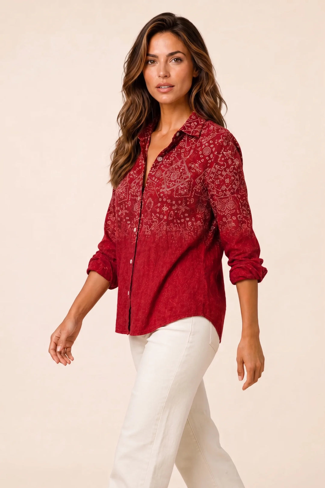 Red bandana print button-down blouse on model in three-quarter turn