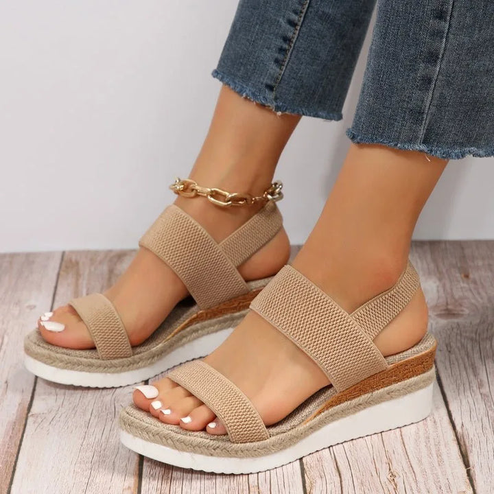 Brown espadrille wedge sandal, side profile view