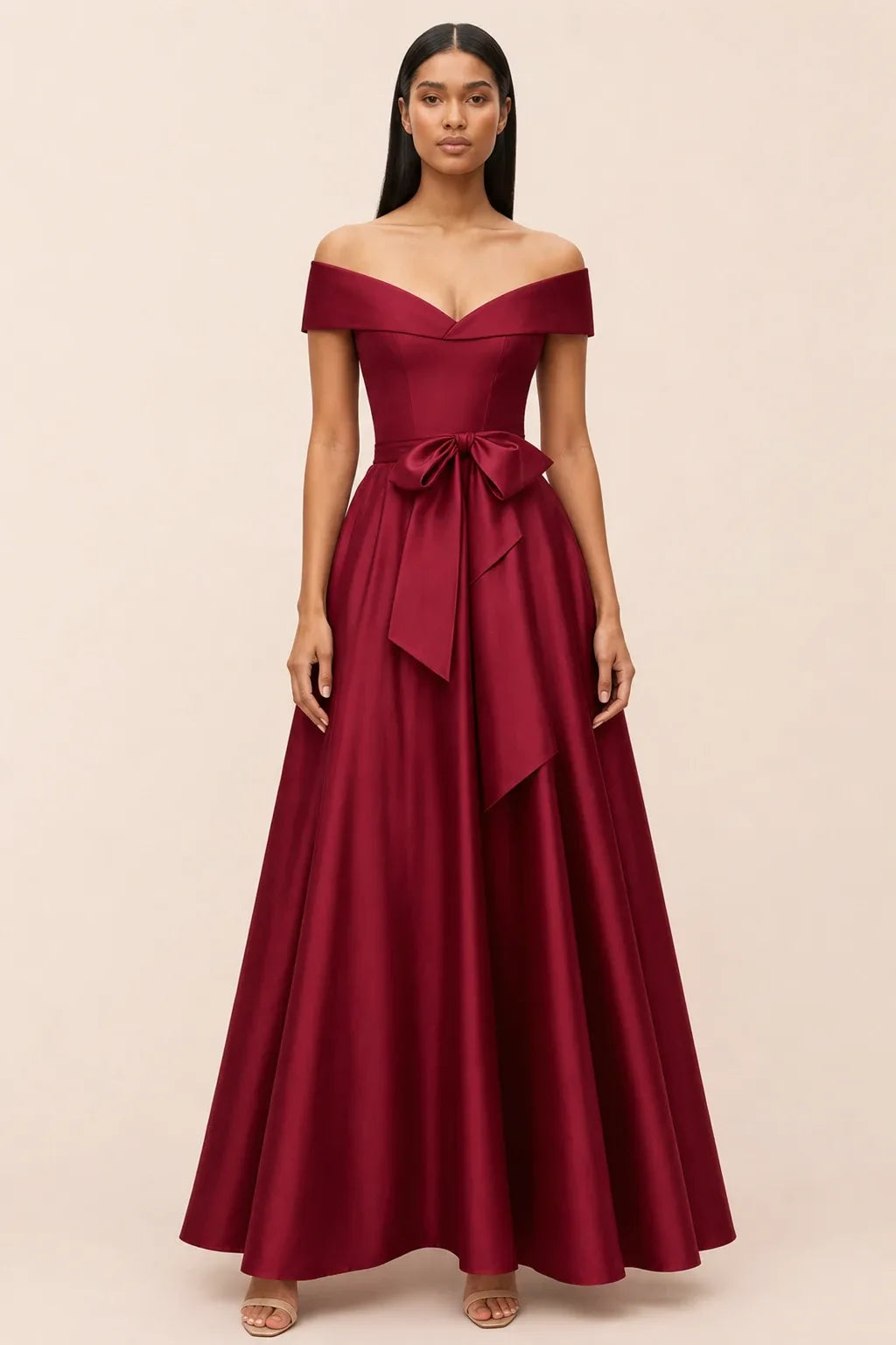 Burgundy off-shoulder midi dress with bow detail, model in contrapposto stance