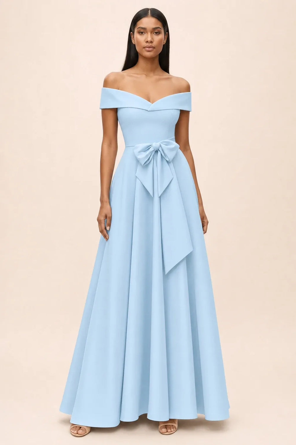 Light blue off-shoulder midi dress with bow detail, model in contrapposto stance